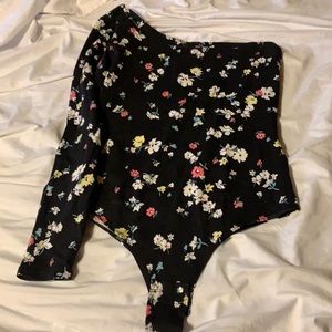 One sleeve bodysuit from Garage! Size Medium!